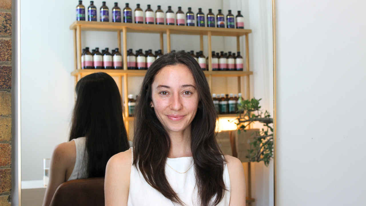 Microbiome Rewilding Naturopath Clinic Brisbane Australia Online Appointments experienced Brisbane Naturopath Lillian Brandt Personalised holistic health for women Naturopath Dispensary Shelves with various herbal medicine bottles and skincare containers in a well-lit room
